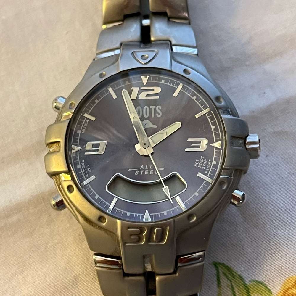 Roots Metallic Silver Watch